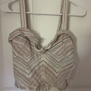 Cute tank top fits a little bit snug and is a size S